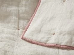 Dotty Quilt In Pottery Pink -furniture 538606 pottery pink dotty quilt throw corner close up